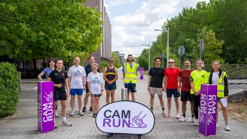 A group of CAMRUN organisers and participants gathered at the starting line.