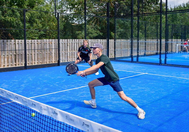 Padel member playing